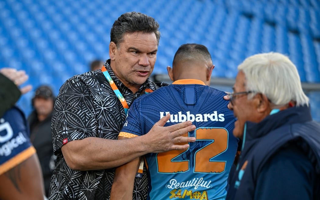 Sir Michael Jones embraces Christian Lealifano of Moana Pasifika.
Moana Pasifika v NSW Waratahs, round 14 of the Super Rugby Pacific competition at Go Media Stadium, Mt Smart, Auckland, New Zealand on Saturday 25 May 2024. © Photo: Andrew Cornaga / Photosport