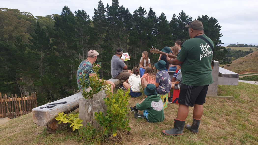 Green School teacher Phil Hoskin working with children.