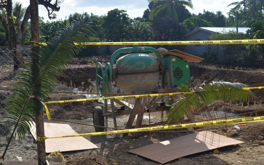 Namele leaves at the building site