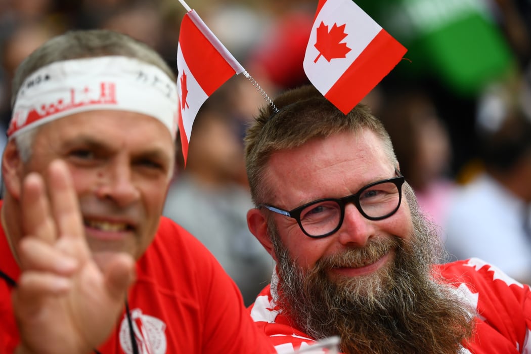 Canada supporters pose   prior to the  Japan 2019 Rugby World Cup Pool B match between Italy and Canada at the Fukuoka Hakatanomori Stadium in Fukuoka on September 26, 2019.