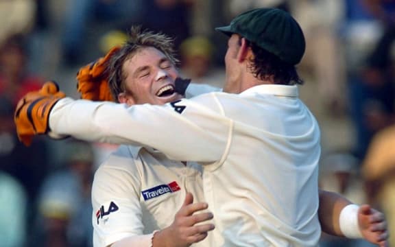 Warne celebrates with Adam Gilchrist Madras 2004.