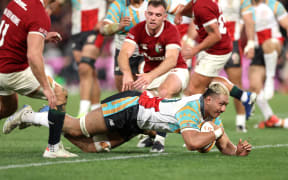 First Nations & Pasifika XV forward Rob Leota scores a try against the British and Irish Lions at Docklands Stadium in Melbourne, 22 July 2025.