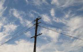 22363608 - electricity pylon against the blue sky