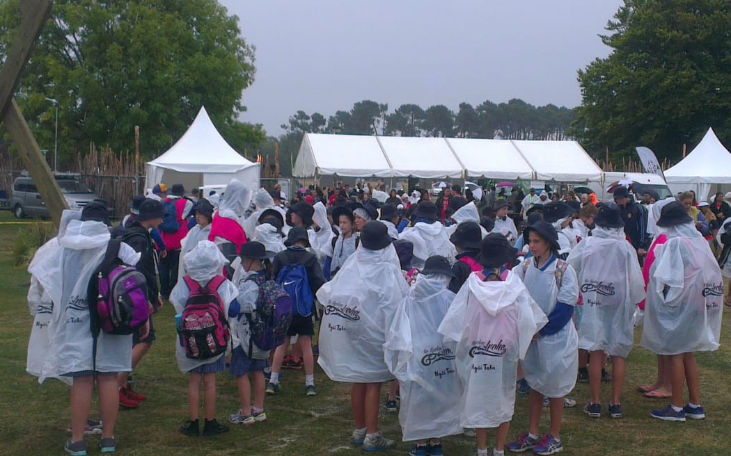 Rain in Christchurch hasn't dampened enthusiasm at Te Matatini national kapa haka festival. Spectators are wearing wet weather gear handed out by Ngai Tahu.