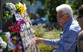 CTV Families Group spokesperson Maan Alkaisi paying tribute to victims at the former site of the building on 16 December, 2020.