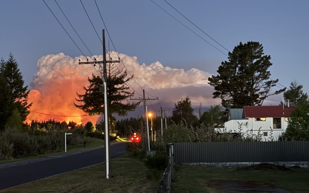 View of the Tongariro National Park fire from Pipers Lodge, Waimarino National Park.