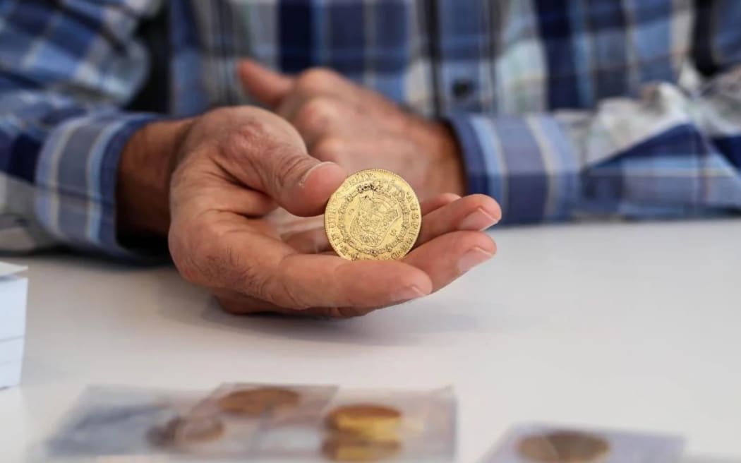 Auckland coin collector out of pocket after elaborate TradeMe scam