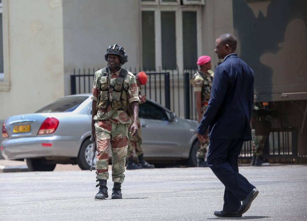 Soldiers seal off a main road to the parliament building in Harare.