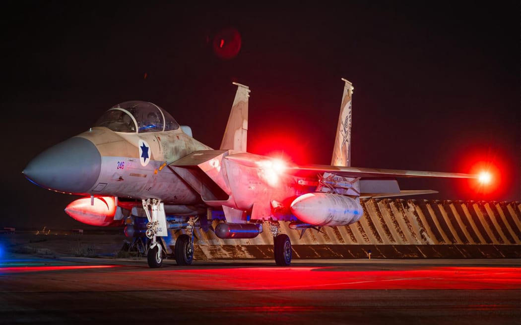 This handout picture released by the Israeli Army on April 14, 2024 shows an Israeli Air Force fighter aircraft at an undisclosed airfield reportedly after a mission to intercept incoming airborne threats. Israel's military spokesperson said "99 percent" of the "300 threats" launched by Iran were intercepted.