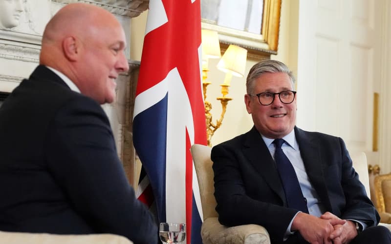 Britain’s Prime Minister Keir Starmer (R) and New Zealand Prime Minister Christopher Luxon (L) speaks during their bilateral meeting inside 10 Downing Street in central London, on April 22, 2025. (Photo by Frank Augstein / POOL / AFP)