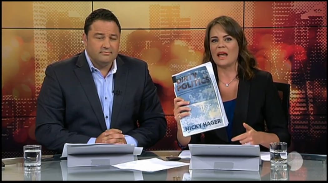 sreenshot of Duncan Garner and Heather du Plessis-Allan on TV3's 'Story' with copy of Dirty Politics
