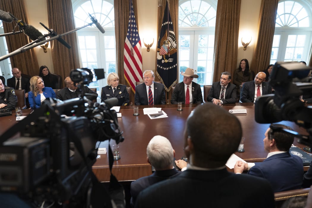 US President Donald Trump participates in a roundtable discussion on border security and safe communities at the White House on Friday.
