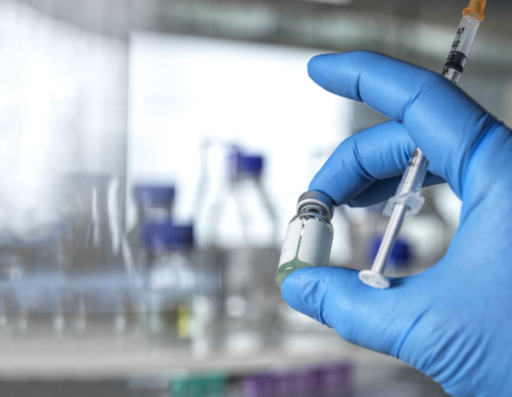 Doctor preparing a drug or vaccine in the clinic.