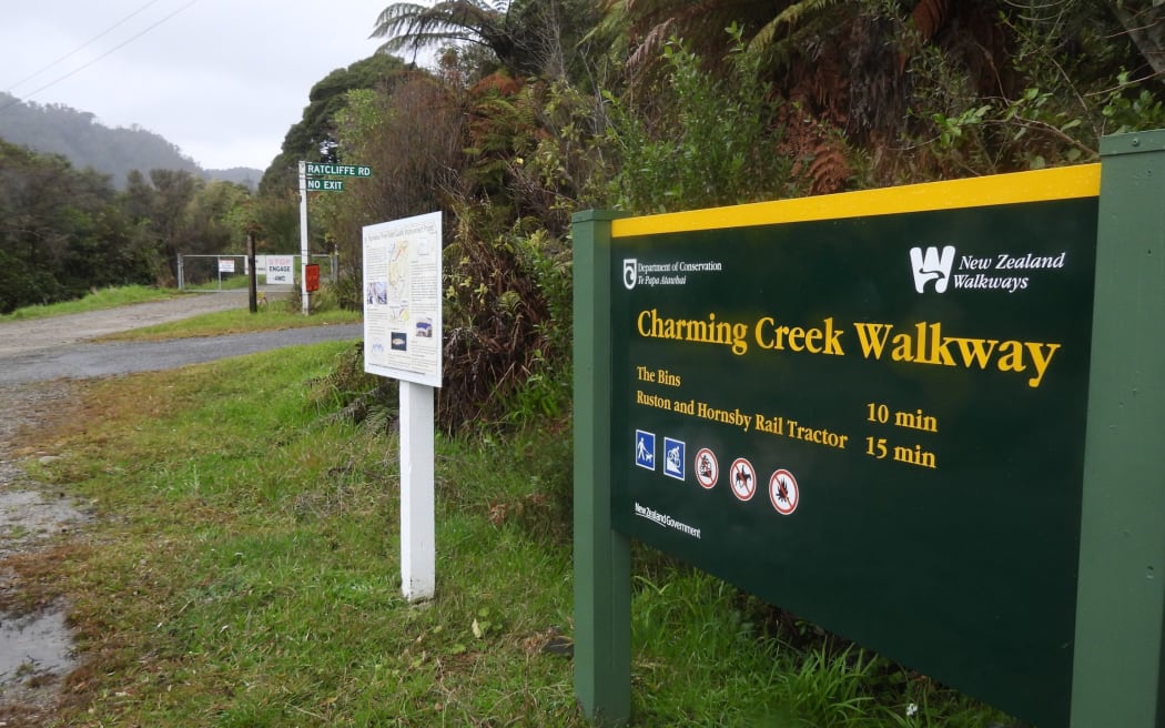 The sign detailing the truncated Charming Creek walkway, at the Ngākawau end.