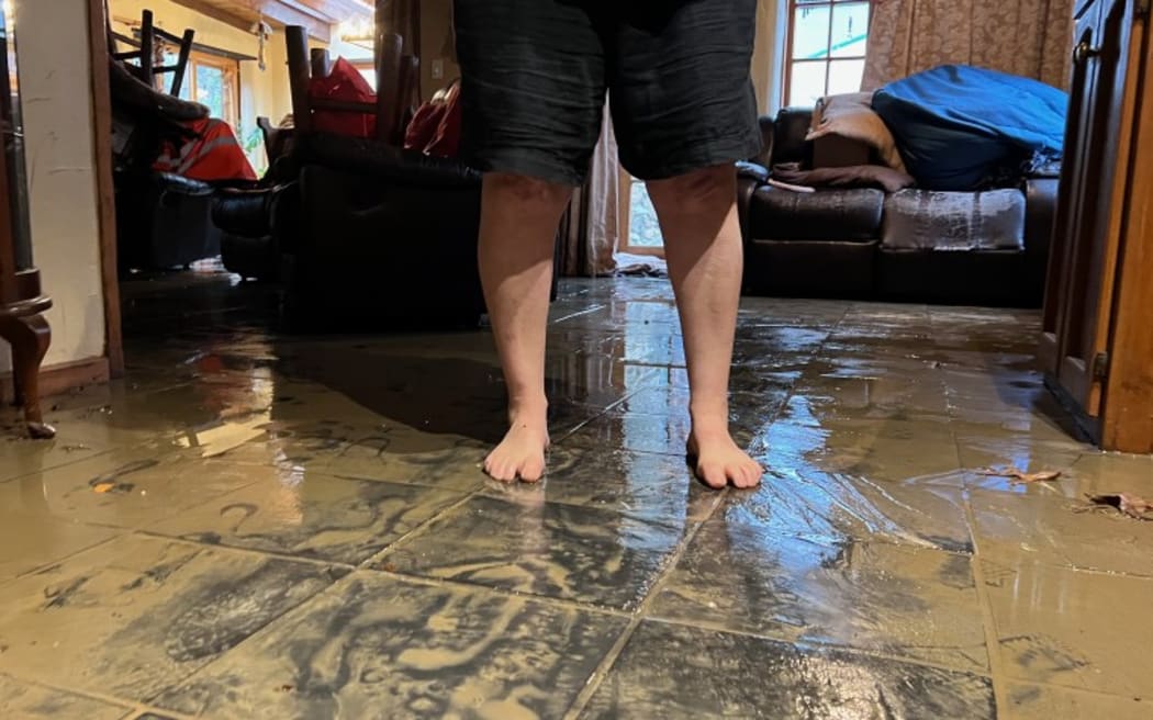 Mud left by flood waters at an Aubrey Road home.