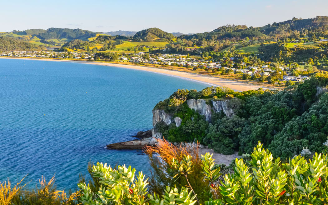 One person dead after falling from cliff at popular Coromandel beach ...