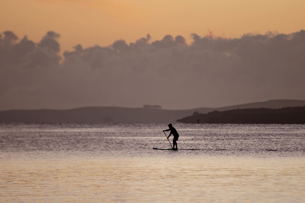 Auckland's Takapuna Beach on the morning of 26 March, on the first day of the nationwide Covid-19 lockdown.