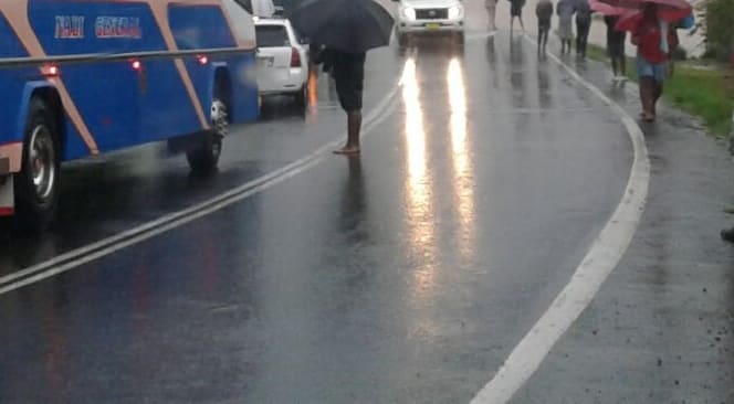 The main Queens Road in Fiji's west  flooded near Nadi on February 8 2017