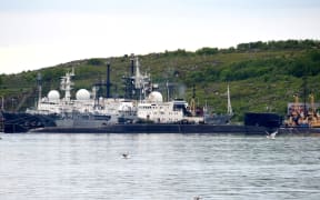 A picture taken on July 2, 2019, shows an unidentified submarine in the city of Severomorsk, in Russia. - Fourteen Russian seamen have died in a fire on a deep-water research submersible, Russia's defence ministry said on July 2, 2019.