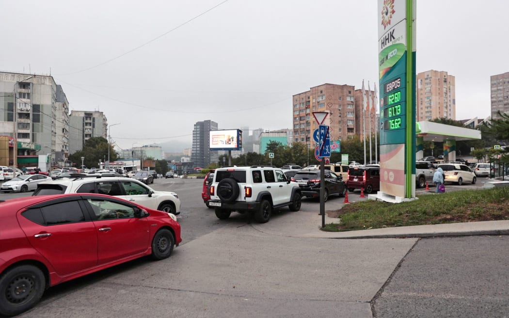 Cars line up to buy fuel at a gas station in Vladivostok, Russia, on August 22, 2025.