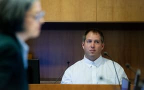 American Matthew Urey in the witness box at the Whakaari White Island eruption trial at the Auckland Environment Court.
12 July 2023. New Zealand Herald photograph by Jason Oxenham