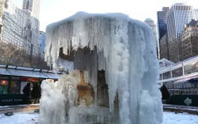 The frozen Josephine Shaw Lowell Memorial Fountain located at Bryant Park in New York is viewed on January 2, 2018.