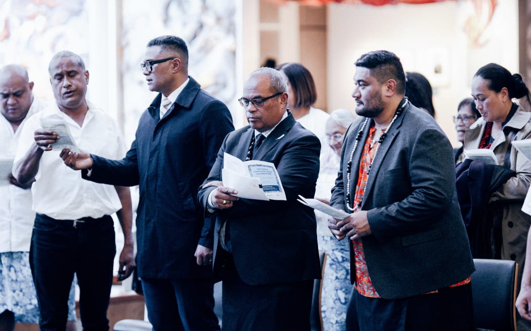 Minister for Pacific Peoples Aupito William Sio, second right, and his CEO Laulu Ma Leauanae, third right.