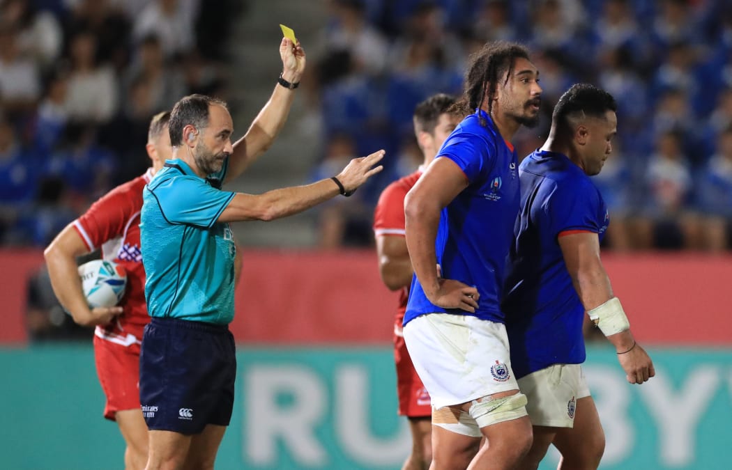 Samoa's Motu Matu'u (R) failed a concussion test after being yellow carded.