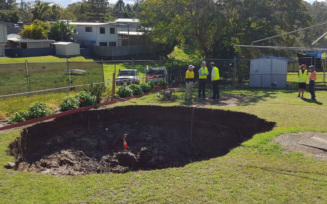 A sinkhole that opened up in an Australian backyard.