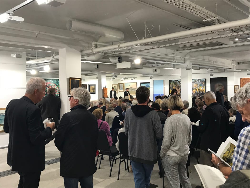 The crowd at the auction.