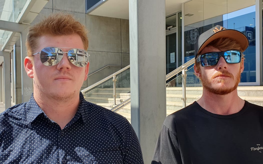 Jake Ginders’ younger brothers Luther Ginders, left, and Dylan Ginders, outside the inquest in Palmerston North.