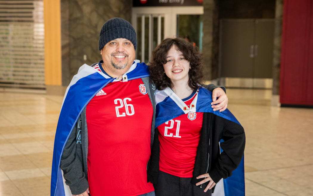 Fans meet the Costa Rican players.