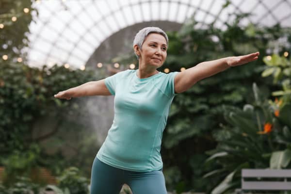 older woman doing yoga