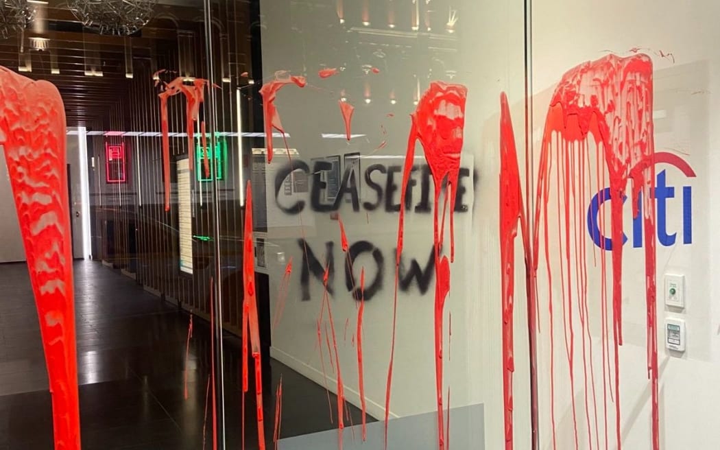 Red paint splashed on the outside of the US consulate in Auckland.