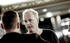 A man who interrupted a press conference by Nicola Willis on 15 March 2024 speaks to staff after the event.