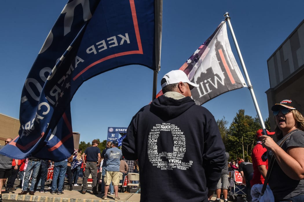 A person wears a QAnon sweatshirt during a pro-Trump rally on October 3, 2020 in the borough of Staten Island in New York City.