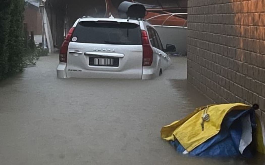 Luisa Hansell has had flooding several times in recent years at her Blockhouse Bay home in Auckland, and is now considering selling up because of it.