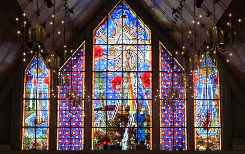 Holy Trinity Anglican Cathedral's Great Window, designed by Nigel Brown, is said to be the largest expanse of stained glass in the southern hemisphere. The windows have a Polynesian and a European side, with the risen Christ in the centre crowned by a flower depicting the seven days of Creation.