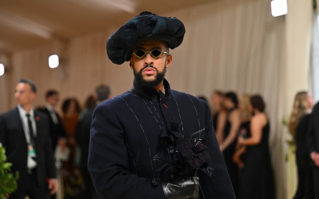 Puerto Rican singer Bad Bunny arrives for the 2024 Met Gala at the Metropolitan Museum of Art on May 6, 2024, in New York. The Gala raises money for the Metropolitan Museum of Art's Costume Institute. The Gala's 2024 theme is “Sleeping Beauties: Reawakening Fashion.” (Photo by Angela WEISS / AFP)