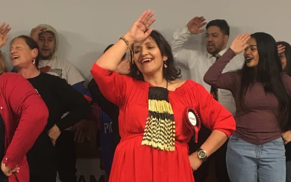 Marama Fox singing with whanau, friends and supporters at Te Rangimarie Marae in Masterton.
