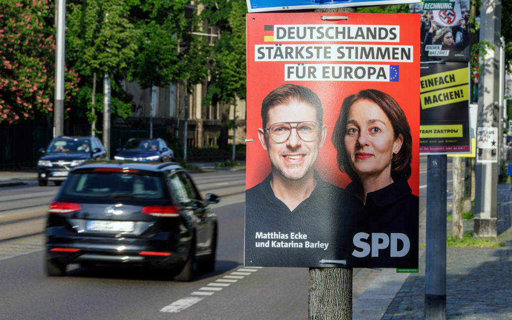 An election poster showing Germany's Social Democratic Party SPD's lead candidate Matthias Ecke (left) for the upcoming European Parliament elections, attached to a lamp post in Dresden, Germany on 4 May, 2024.