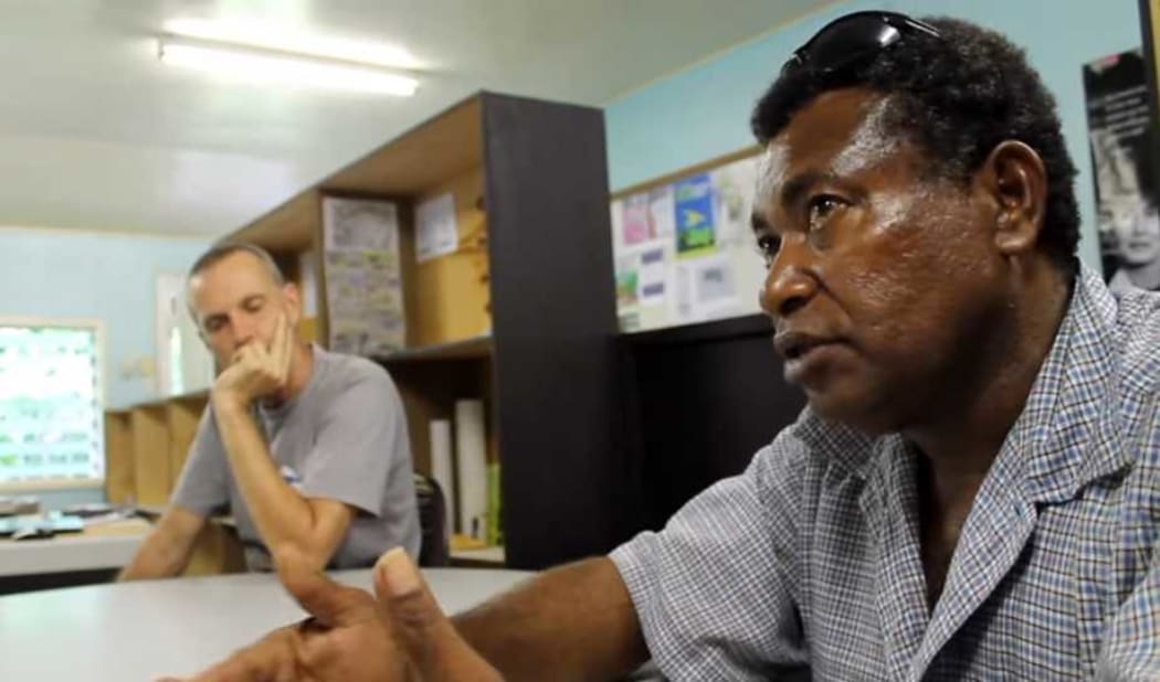 Pomio landowner Nobert Pames (right) has campaigned for years to regain access for his community to its own land in the face of logging development.