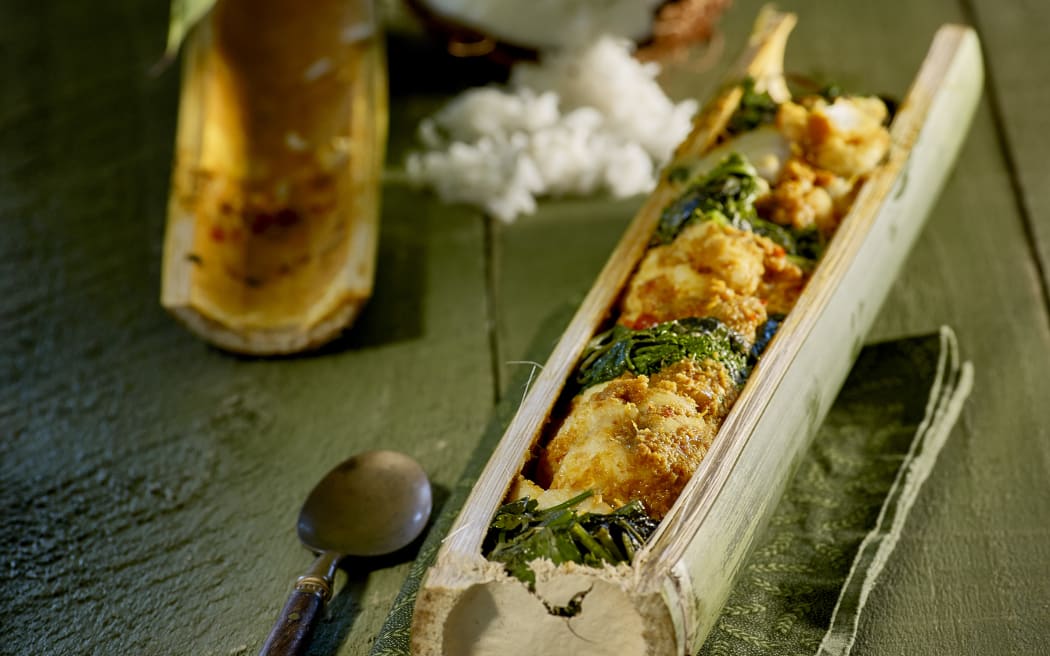 Curried fish in bamboo with coconut rice