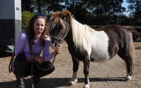 Chloe Phillips-Harris with Opi, who arrived at her Kerikeri farm with serious health and behavioural problems, but is now a star of the annual Great Northern Gallop.