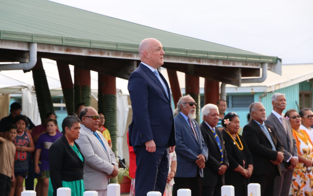 Luxon stands during a ceremony in Niue.