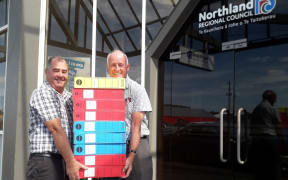 John Bain (right) with fellow Democracy Northland member Robin Grieve in February 2021 outside NRC in Whangārei with boxes of signatures petitioning that council as well as WDC and KDC to poll their communities about new Māori wards.
