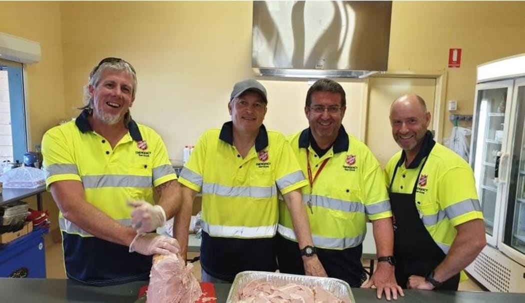 New Zealand Salvos (from left) Captain Karl Foreman, Captain Steve Molen, Michael Douglas and Captain Robert Adams assist at the Moruya Evacuation Centre in NSW.