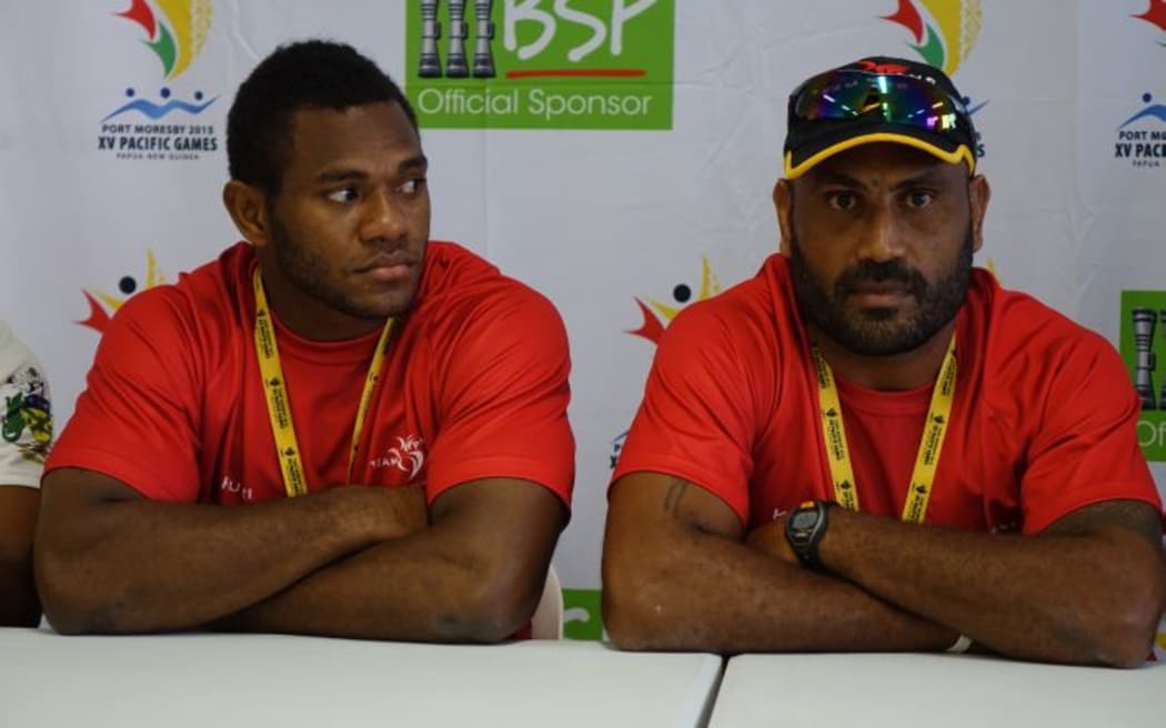PNG captain Israel Eliab and coach Michael Marum