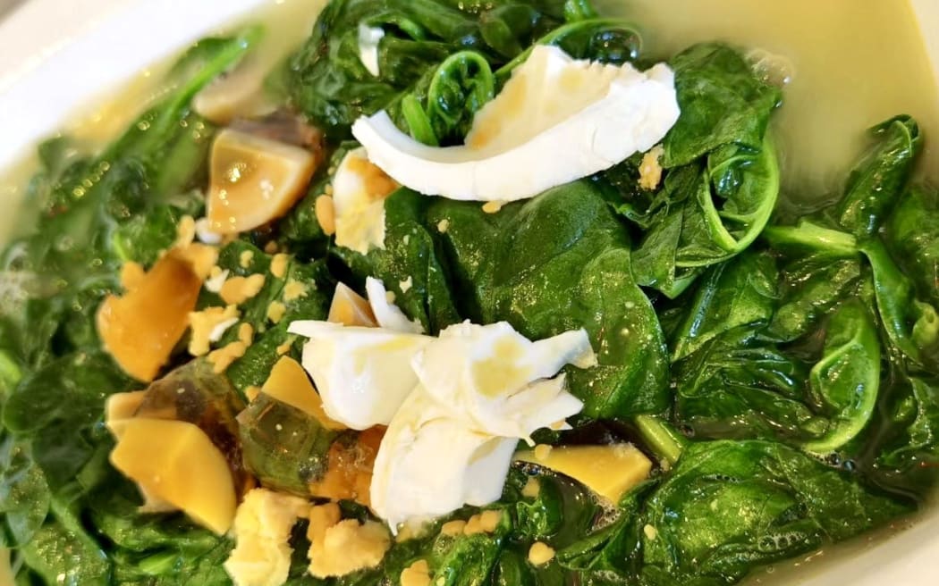 Wan dou miao in broth (pea shoots).