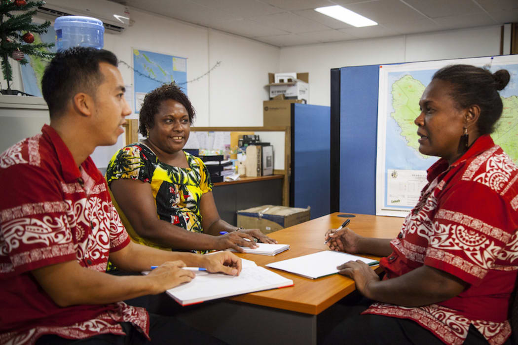 A group working on foreign aid strategy in Solomon Islands.